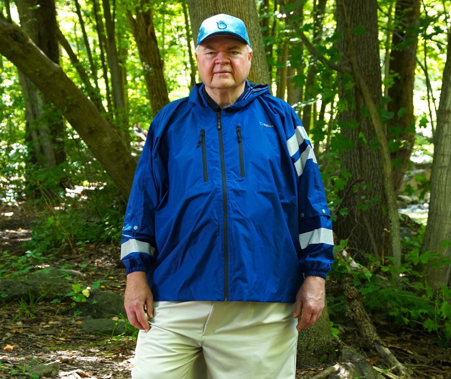 Brella 2020 Light Blue Unisex Hybrid Rain Jacket w/ Reflective Body and Sleeve Strips by The Brella Nation